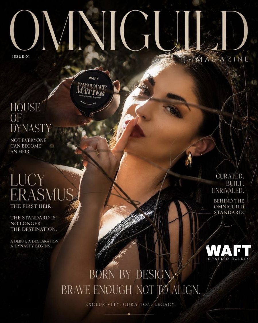 Omniguild Issue 01 cover: Lucy Erasmus with a finger raised to her lips